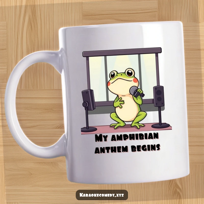 Funny mug featuring a green frog in a karaoke booth, microphone held high, singing with pure joy and enthusiasm.