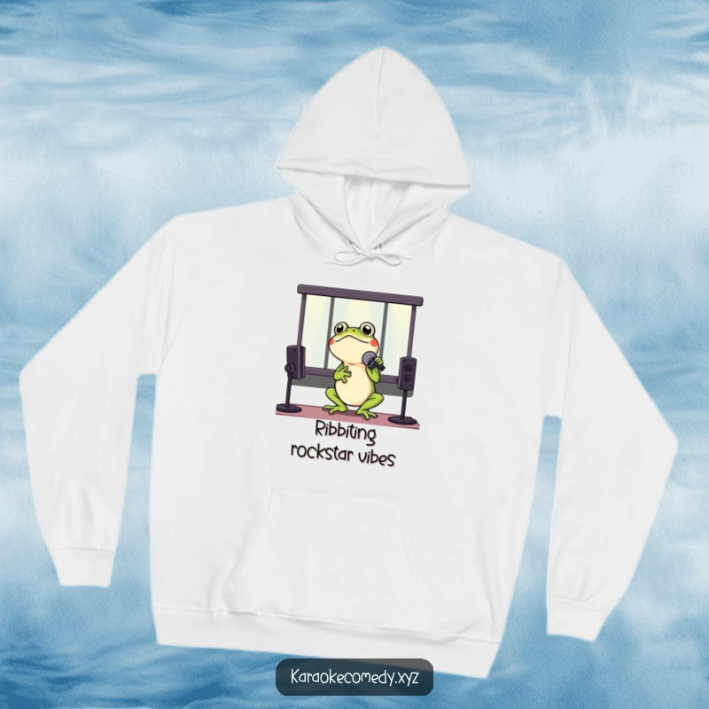 Funny hoodie showcasing a cheerful frog belting out a tune with a microphone in a lively karaoke booth.