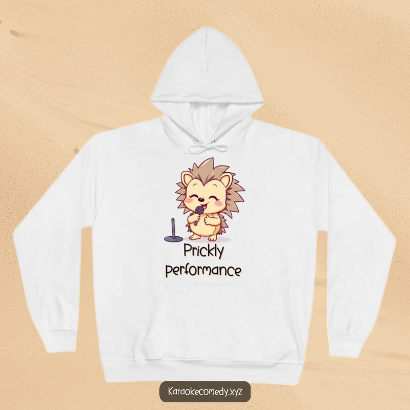 Funny hoodie featuring a happy hedgehog at a microphone stand, raising a paw in song with cheerful energy.