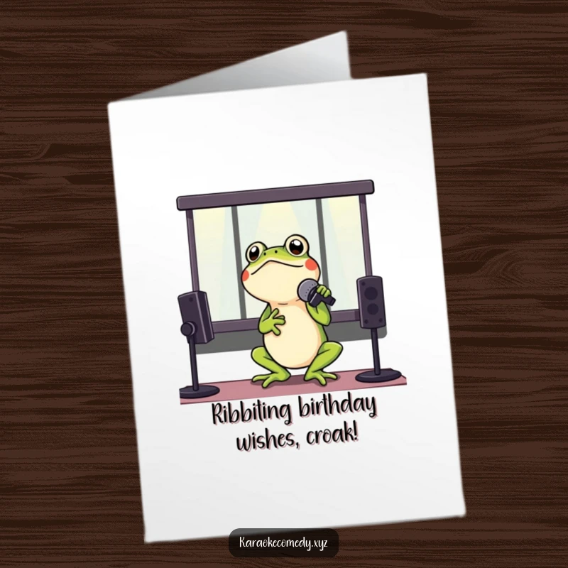 Funny Free Printable Birthday Card: A singing frog belts a tune in a karaoke booth, microphone held high, ready to party.